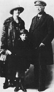 Two grown-ups and a small boy